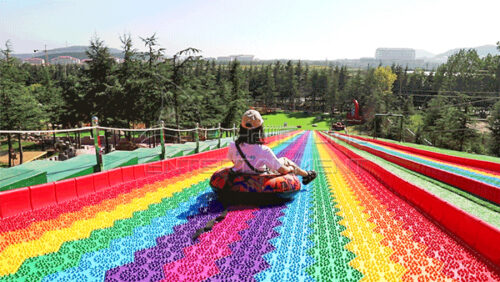 Rainbow slide amusement ride